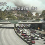 Smoke and highway backup from brush fire
